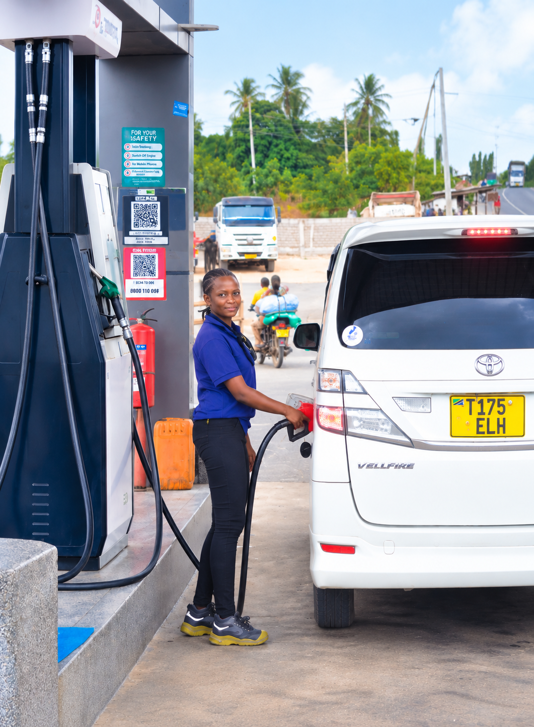 Davida Oil fuel attendant refueling a vehicle